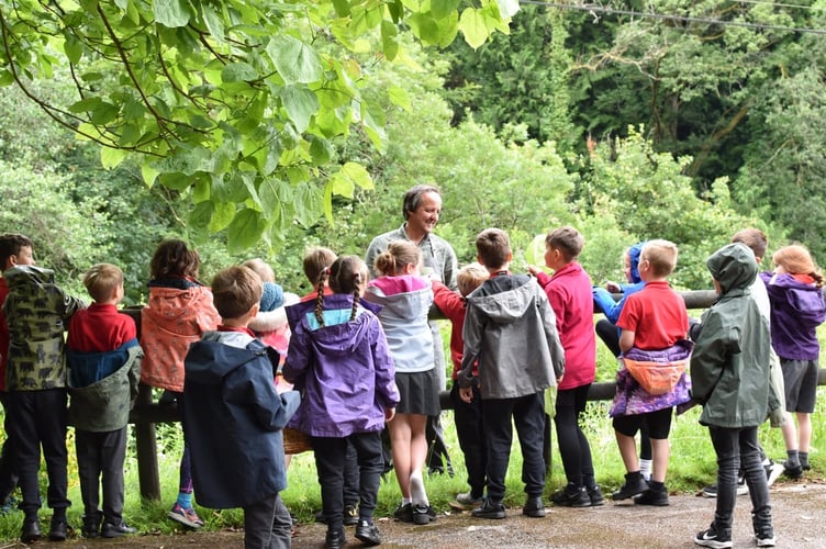 Chris shows the youngsters all about foraging for food