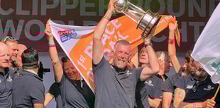 Sailor Eric celebrates round world victory