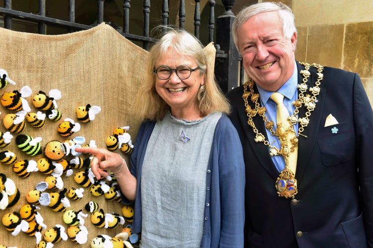 Mayor of Monmouth, Cllr David Evans with Bees for Development's director Nicola Bradbear
