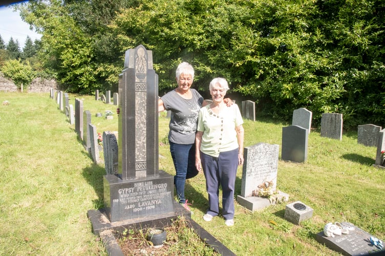 Pauline Watkins and Jennifer Lewis at the grave of Gypsy Petulengro at Viney Hill Church.