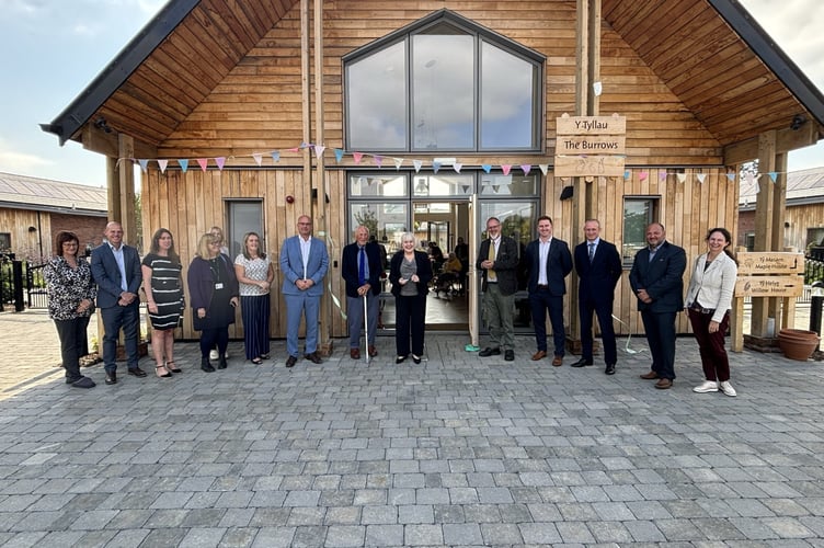 Council Leader Cllr Mary Ann Brocklesby and guests in front of the Village Hall at Severn View Park Care Home