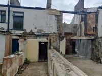 Redevelopment bid for town centre explosion house