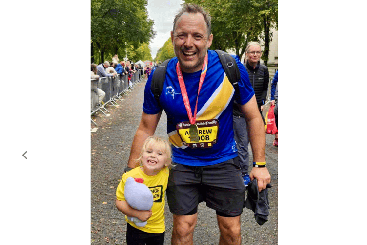 Andrew with a young supporter