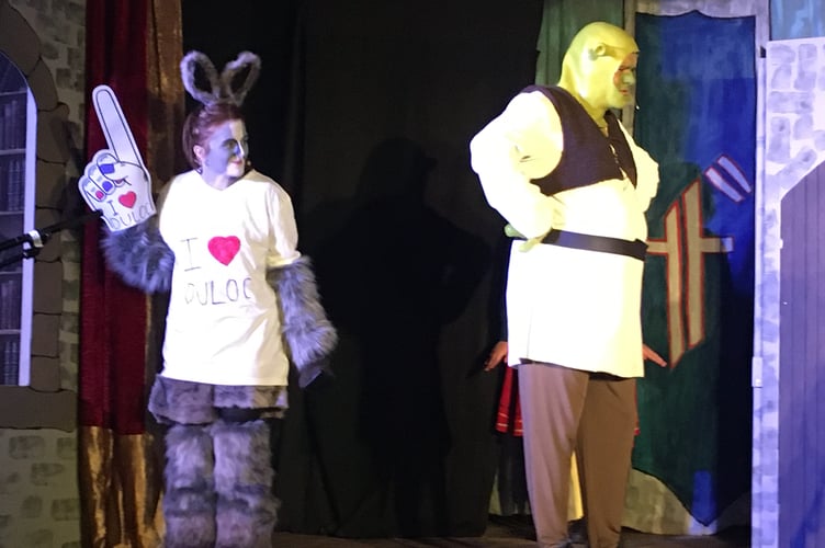 Donkey (Megan Evans) and Shrek (Nick Taylor)