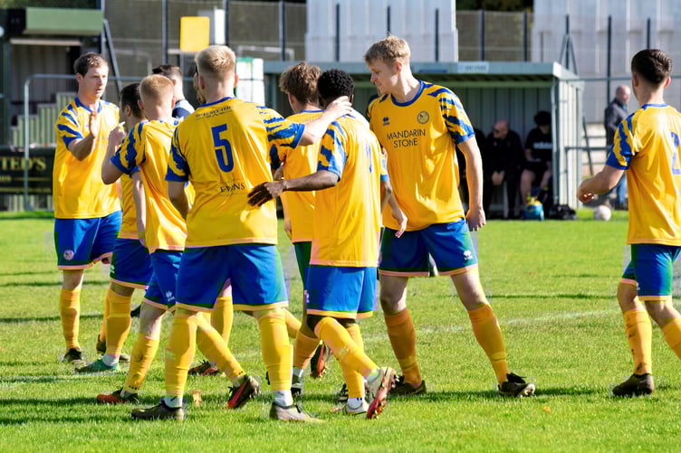 Monmouth celebrate their opening goal