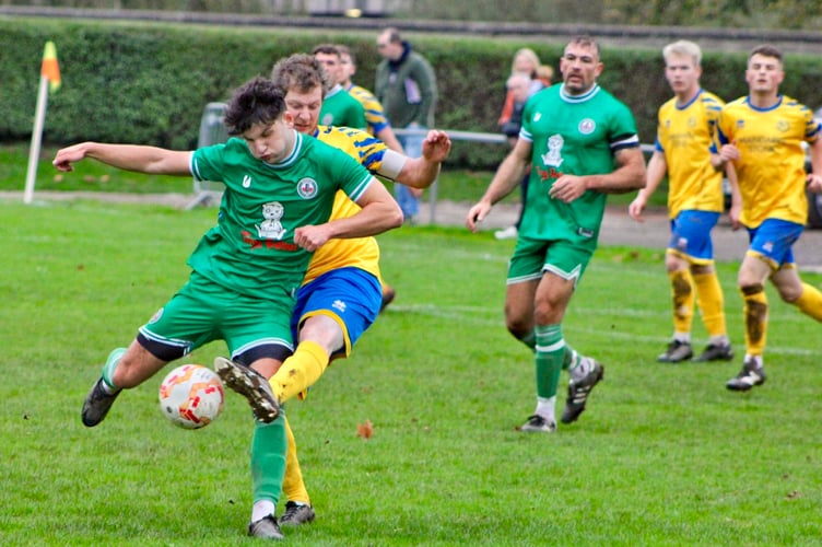 A Kingfisher player battles for the ball 
