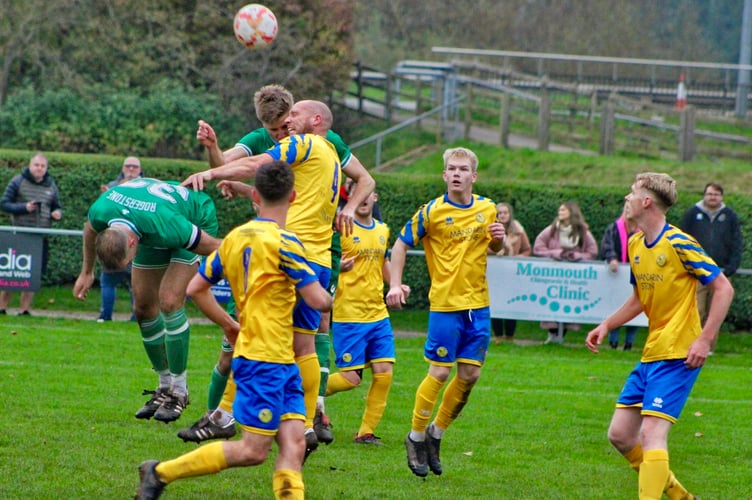 Players leap for the ball in the Monmouth v Rogerstone 3-3 draw