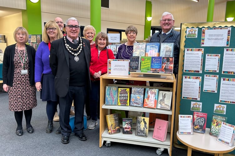 Vice-Chair of Monmouthshire County Council and Chair of the Friends of Caldicot Library Group, Cllr Peter Strong launched the new scheme at Caldicot Library with members of Friends of Caldicot library