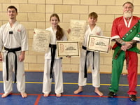 Trio kick on with black belt tae kwon-do gradings