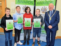 Volunteers honoured as pride of town