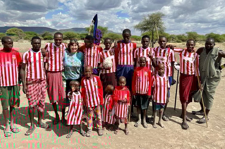 Youngsters proudly wear their donated Ross Juniors kit