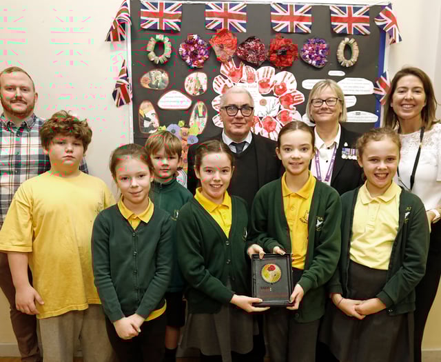 School is county's first to win Forces award