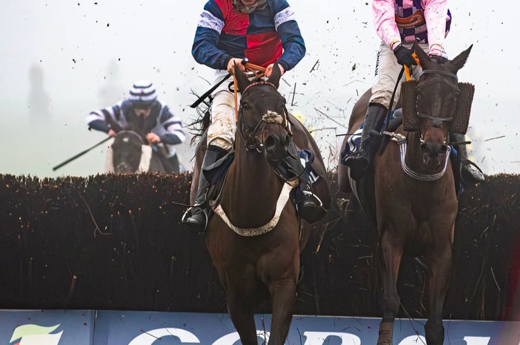Iwilldoit and Val Dancer fight it out in the closing stages of the Welsh National