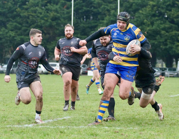 Monmouth's Shaun Hobbs has his eyes firmly on the line for the first of his two tries