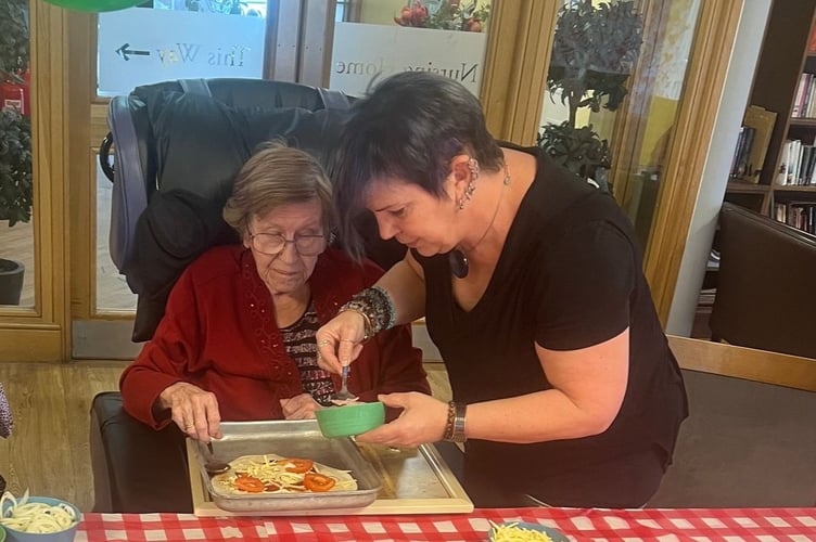 Residents at Gibraltar Nursing Home in Monmouth making their pizzas 