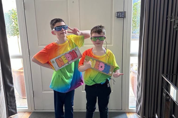 Freddie and Albie dressed up for World Book Day and had to dress up as a word which was neon.