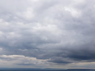 Partly cloudy today and tomorrow with little chance of rain
