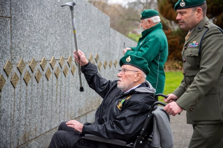 One-hundred-year-old veteran John Eskdale inspires the next generation of Royal Marines during a visit to the Commando Training Centre in Lympstone, Devon. Release date February 21 2025. A 100-year-old World War Two commando inspired the next generation of Royal Marines during a visit to the Commando Training Centre in Lympstone, Devon. John Eskdale from Lydney in Gloucestershire saw combat with HMS Charybdis in the Mediterranean on the Malta Convoys in 1942 and was involved in the invasion of Sicily in the summer of 1943. He survived the sinking of Charybdis by German Torpedo boats near the Channel Islands in late 1943 and went onto see action in Normandy and in the Far East.