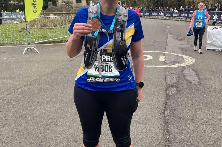 Julie Glyn-Jones overcame chaos at the start to complete the tough Bath half marathon