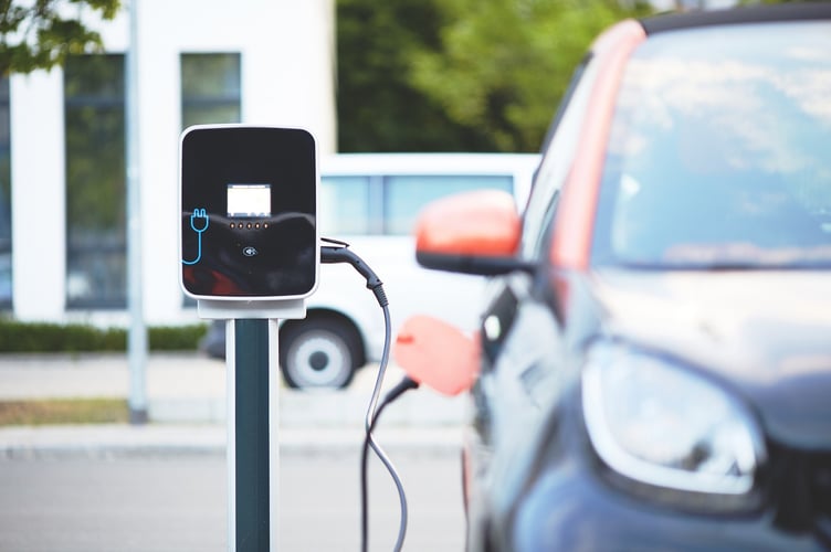 An electric car being charged.