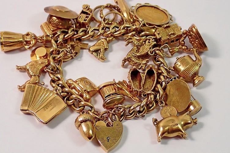 Gold Charm Bracelet Sold £1,750