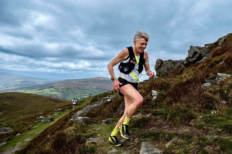 A runner pushed upwards in the Llanbedr to Blaenavon fell race