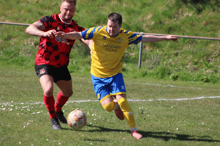 Dan Macdonald turns his man