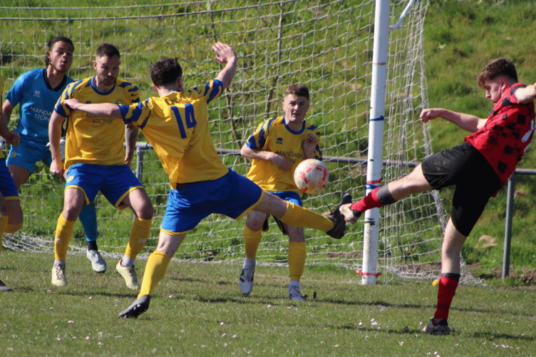 A New Inn player fires in a shot