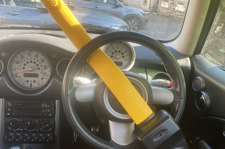 As high-tech car thefts continue to rise, experts recommend simple physical barriers like steering wheel locks to protect vehicles from criminals