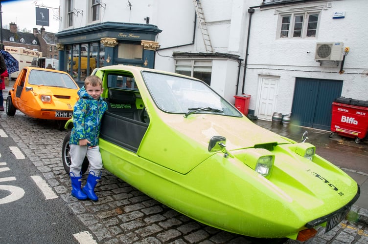 Four-year-old Marley Kimber of Llandovery admires a Bond Bug