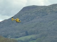 
Yellow chopper on the Skirrid gets onlookers in a whirl!  