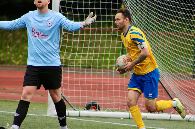 Monmouth score and the Cwmbran keeper can't believe it