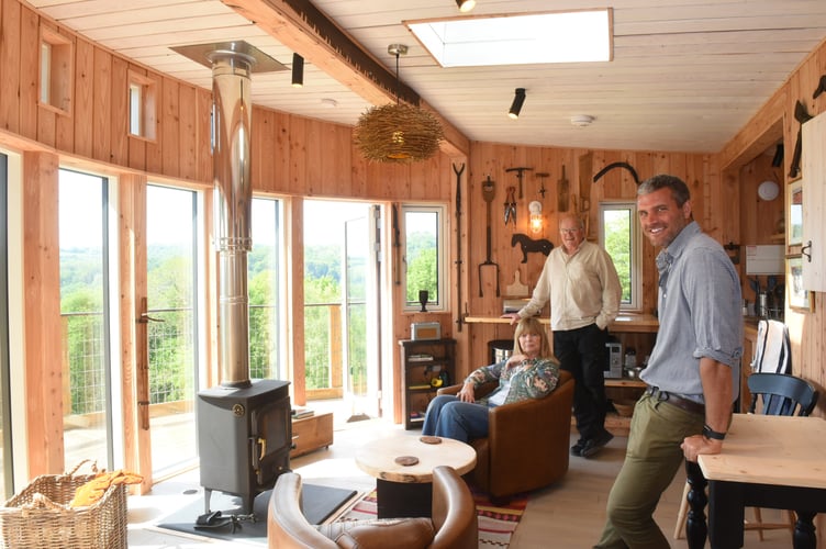 Jake enjoying the launch of the cabins with architect Rod James and Fiona Markham