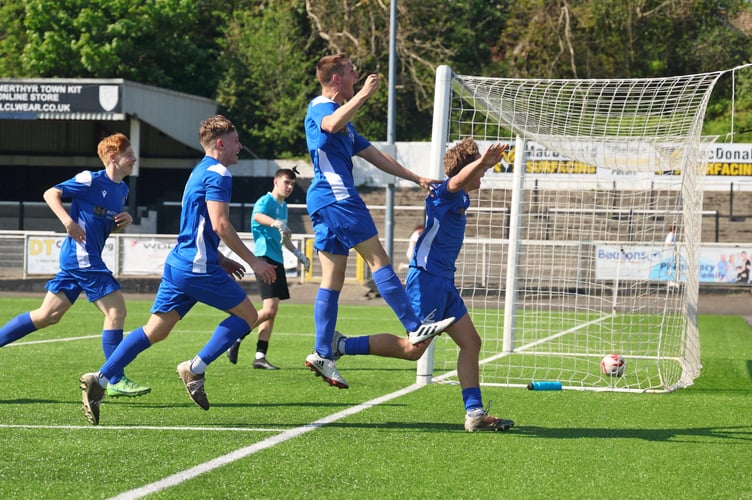 Celebrations as the ball nestles in the goal for what proved Monmouth's winner