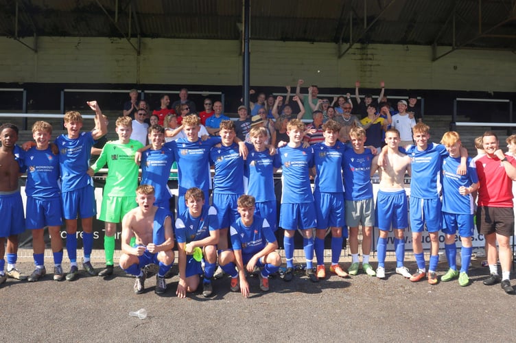 Monmouth Comprehensive players celebrate with friends and family