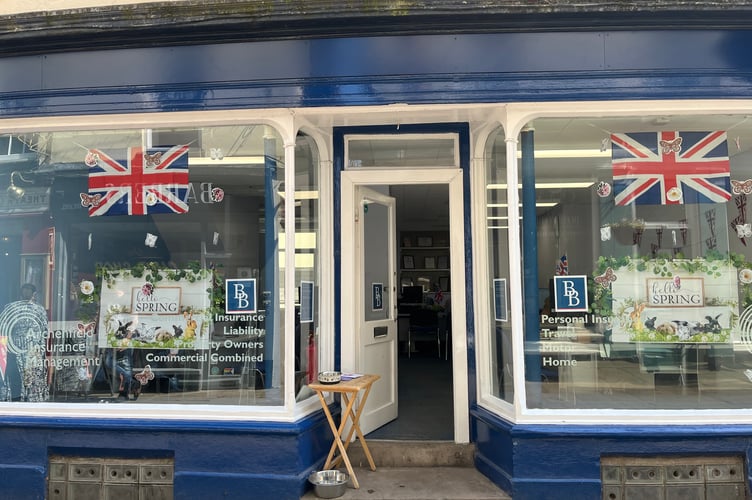 Brown and Brown VE day decorated window display.