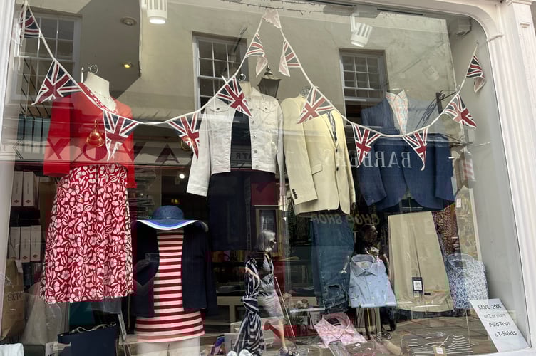 Extons VE day decorated window display.