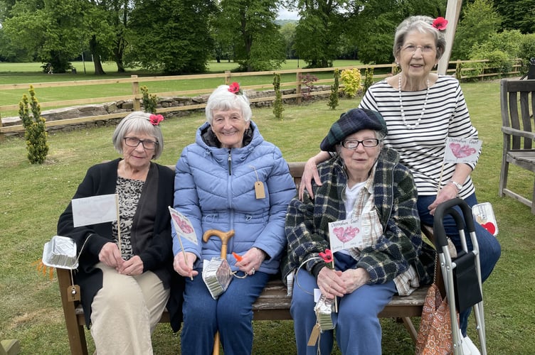 Members from the community in Monmouth gathered for a VE day commemoration.