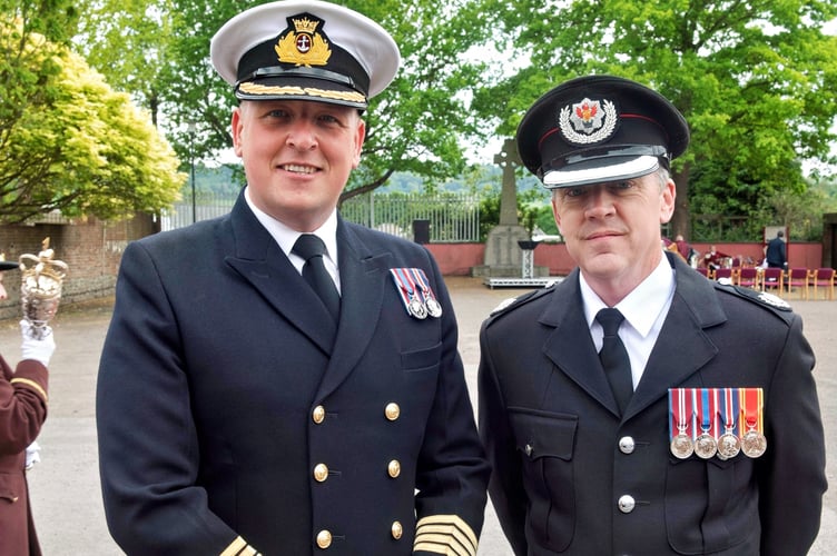 James, left and Darren right pictured at Monmouth's VE Day public service on Parade Square