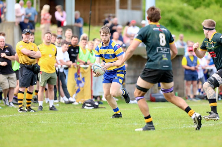 Liam Churches looks for a way through