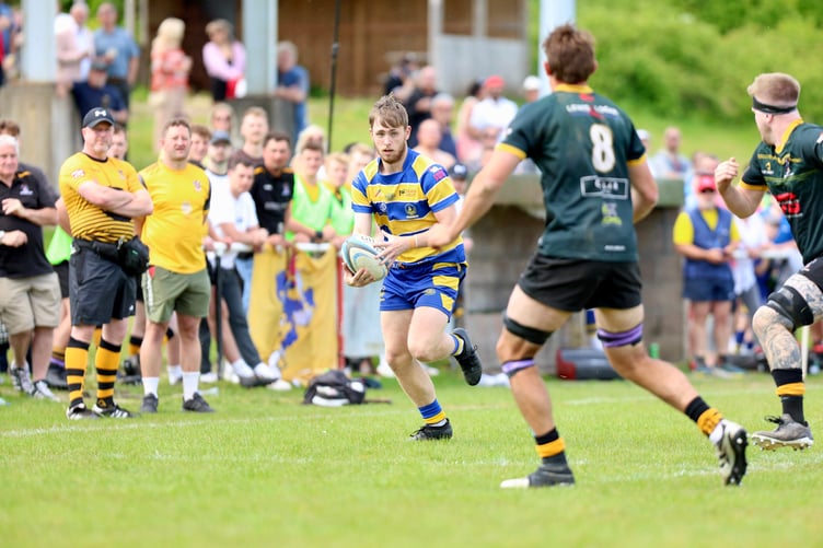 Liam Churches looks for a way through