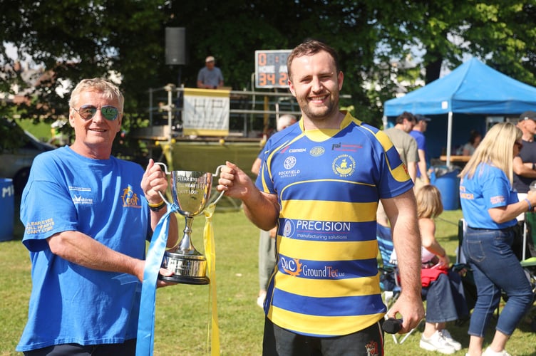 Monmouth skipper and TSF Co Chair Cam Boycott collects the trophy from Syd Senior