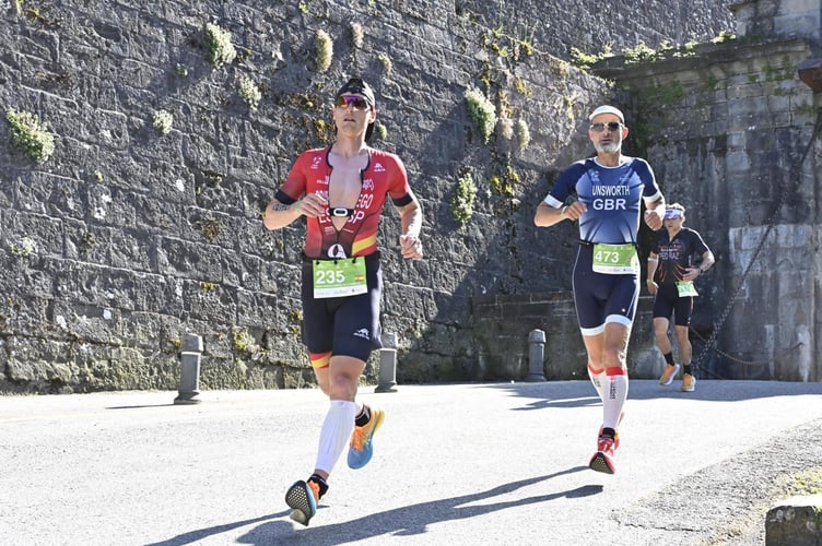 Matt Unsworth, right, racing in