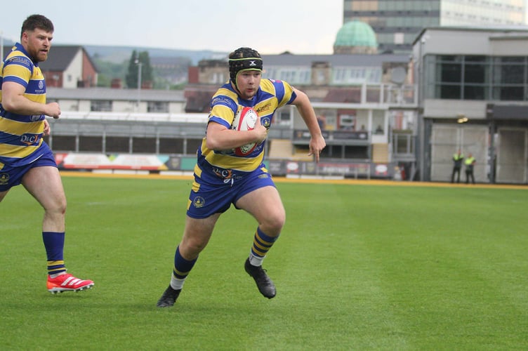 Harley Thorpe eyes the line for his try