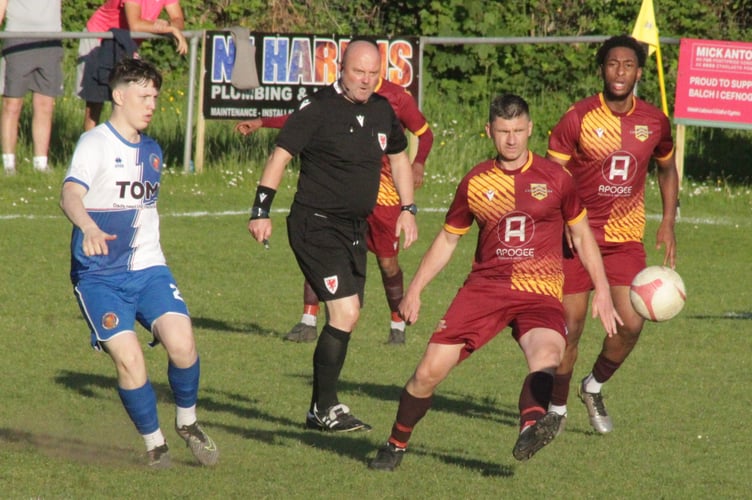 Chepstow (blue and white) led 2-0 in the Ardal South Cup final with 35 minutes to go, but lost 5-2 to Cardiff Corinthians