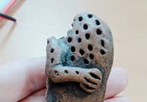 Rare medieval jug shard discovered in garden dig