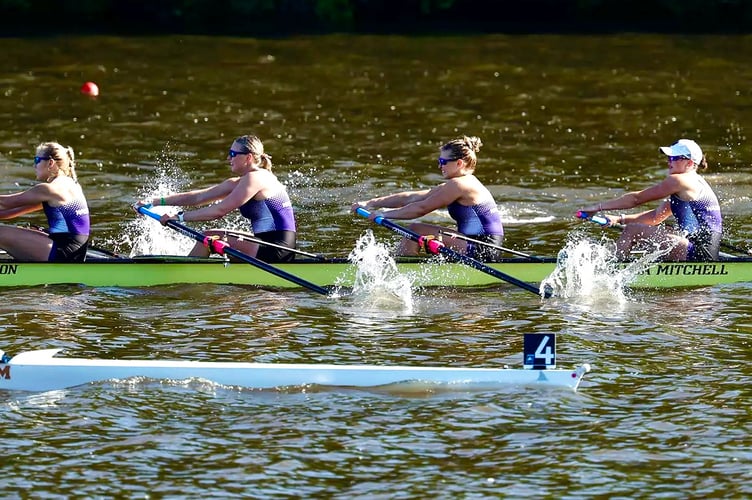 Violet Holbrow-Brooksbank, far left, powers her crew home to silver