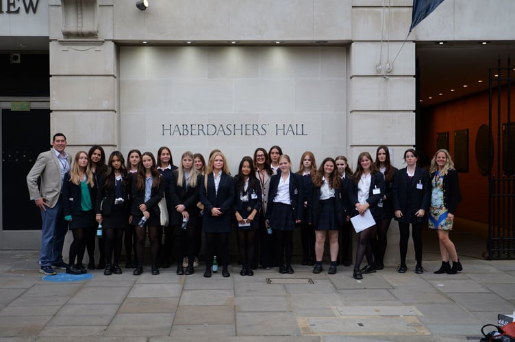 Haberdashers' Monmouth School students at the fashion show event .
