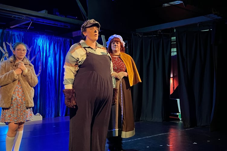 Mr Beaver (Phillippa Hickey) and Mrs Beaver (Marianne Bowen) with Lucy (Anwen Pugh).