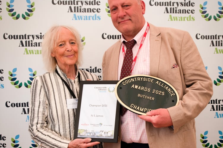 President of the Countryside Alliance, Baroness Mallalieu.
handing over the award to Raglan butcher Neil James